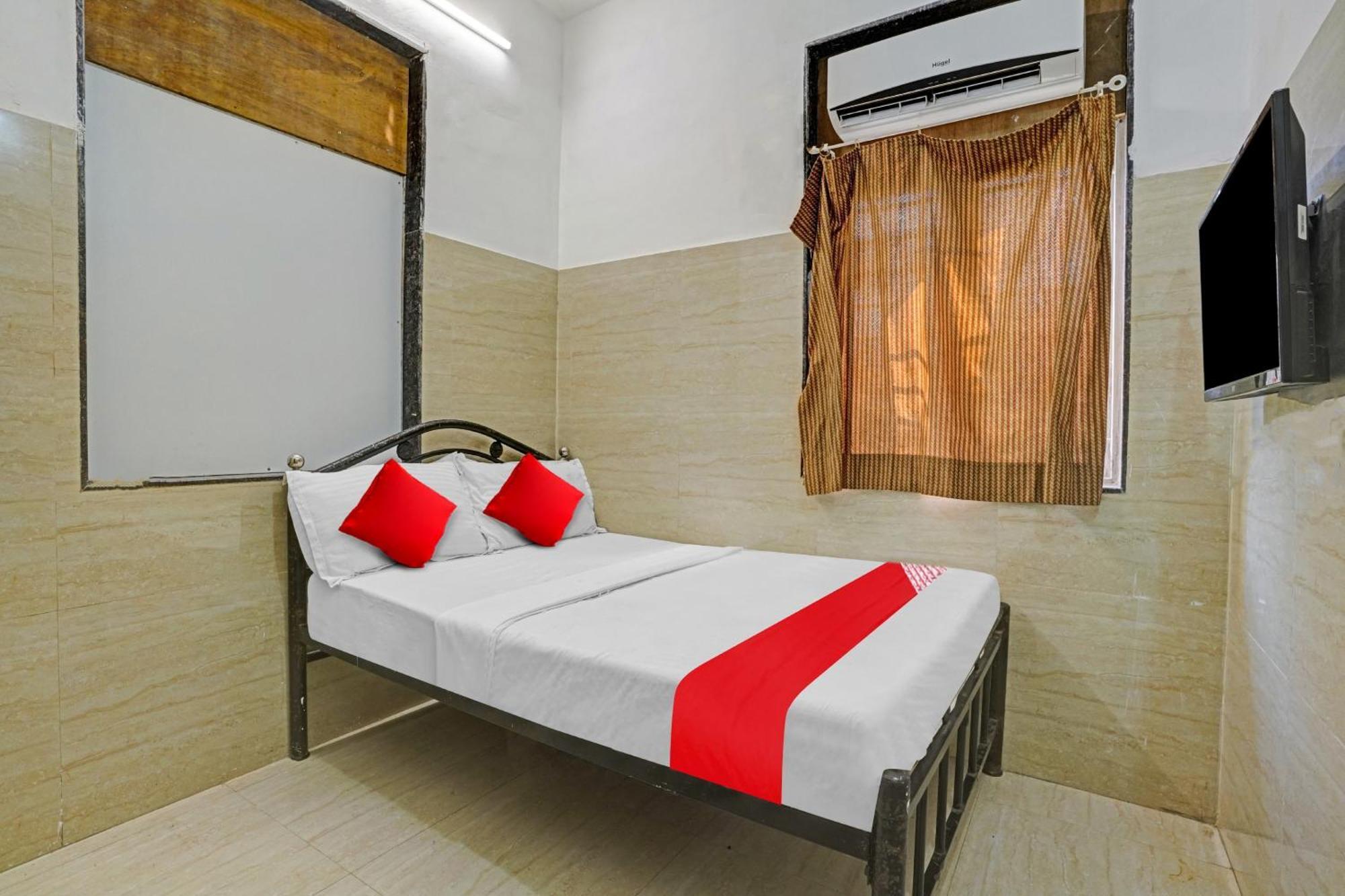 Hotel Oyo Flagship Raj Near Juhu Beach Mumbai