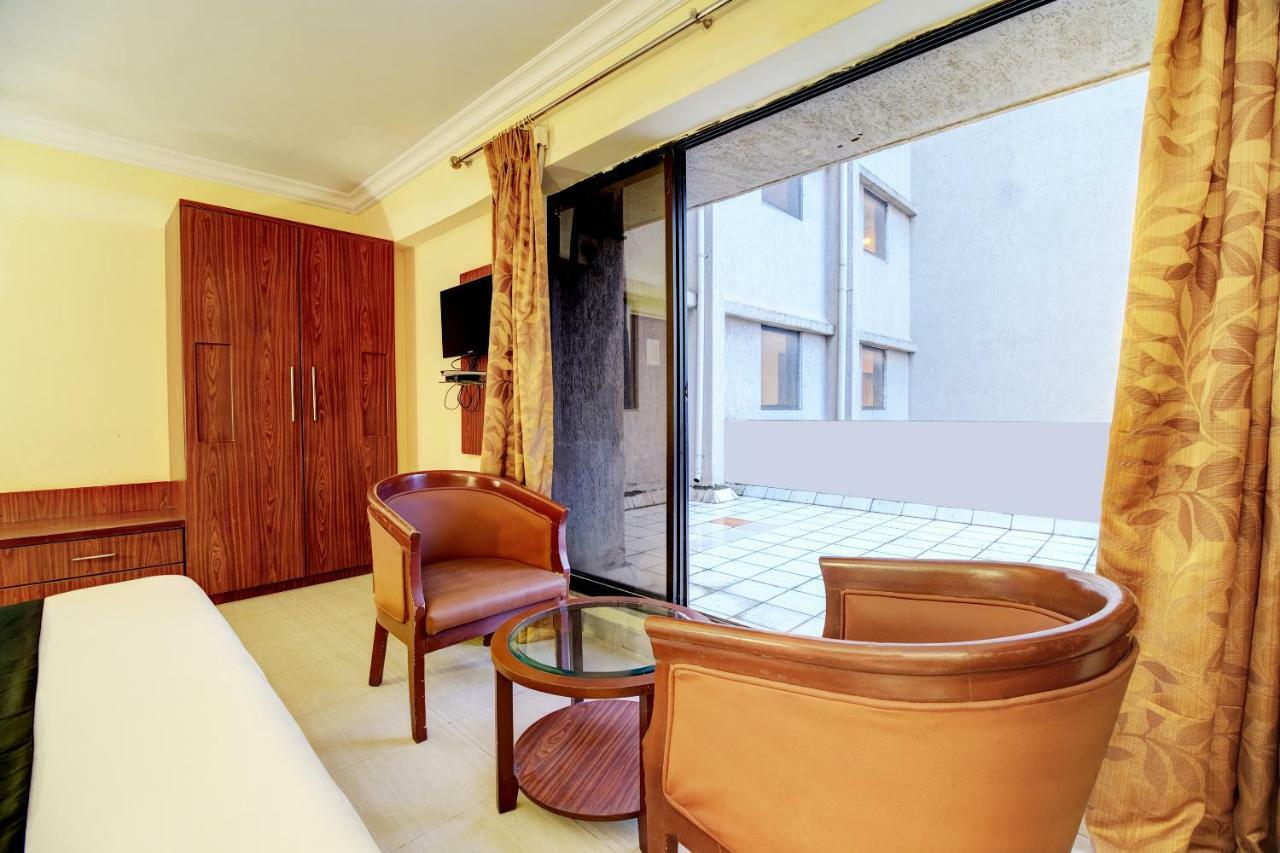 Capital O 48073 K Star Hotel