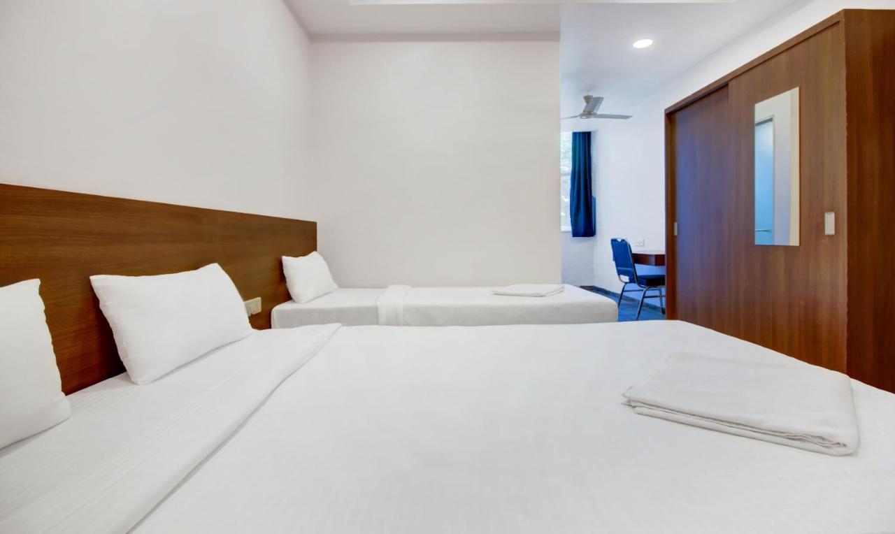 Fabexpress Nirvana Grace Hotel